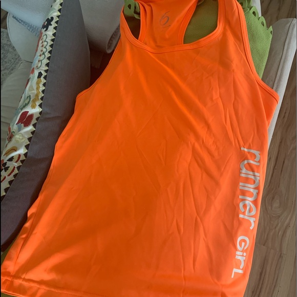 6 Tops - Runners shirt. I am not certain of brand.